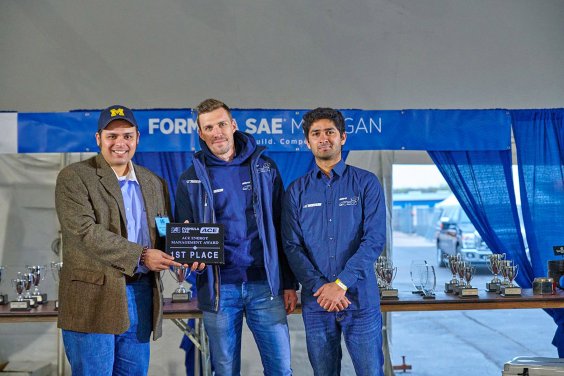 The racing team of Stuttgart University, Germany, wins the ACE Energy Management Award in 2019. Peter Maderthaner (middle), Subteam Leader & Aero CFD from the Stuttgart team, receives the award with Anurag Ramarao Murali (right), Monocoque and Aero Structure Simulation, in the USA from Rahul Chandrashekar, Technical Expert and Software Systems Architect at ACE Controls Inc