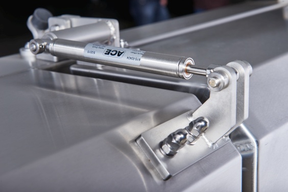 Industrie-Gasdruckfeder von ACE aus Edelstahl sorgen auch in der Lebensmitteltechnik f&uuml;r Kraft und Reinheit beim &Ouml;ffnen und Schlie&szlig;en von Abdeckhauben und Wartungsklappen.